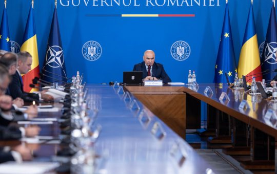 Guvernul Interimar Condus de Ilie Bolojan: Provocări și Atribuții în Contextul Politic Românesc